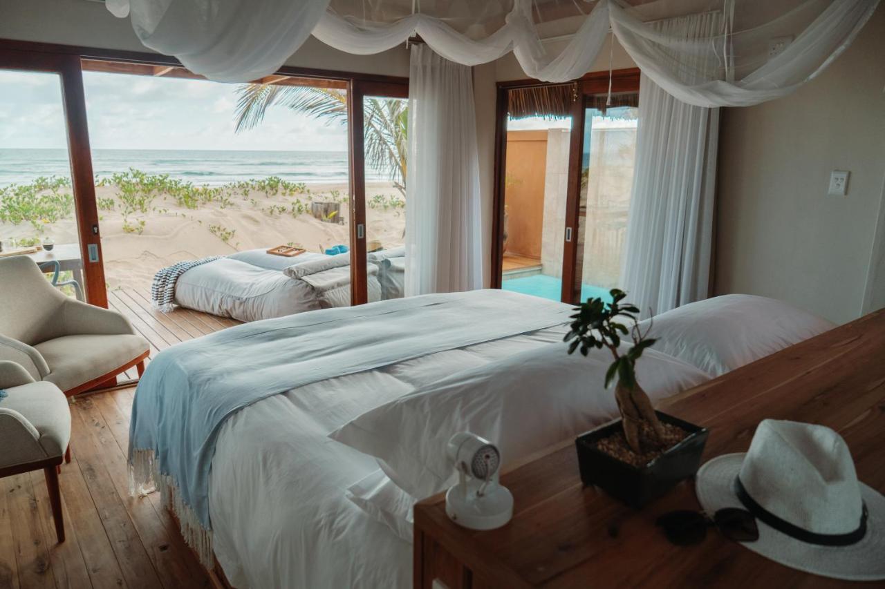 Eclectic Beach Retreat Cabo Nhamua Bagian luar foto